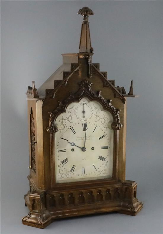 Barraud & Lund, Cornhill, London. A Victorian gothic cased oak eight day bracket clock, width 16in. depth 10in. height 24.75in.